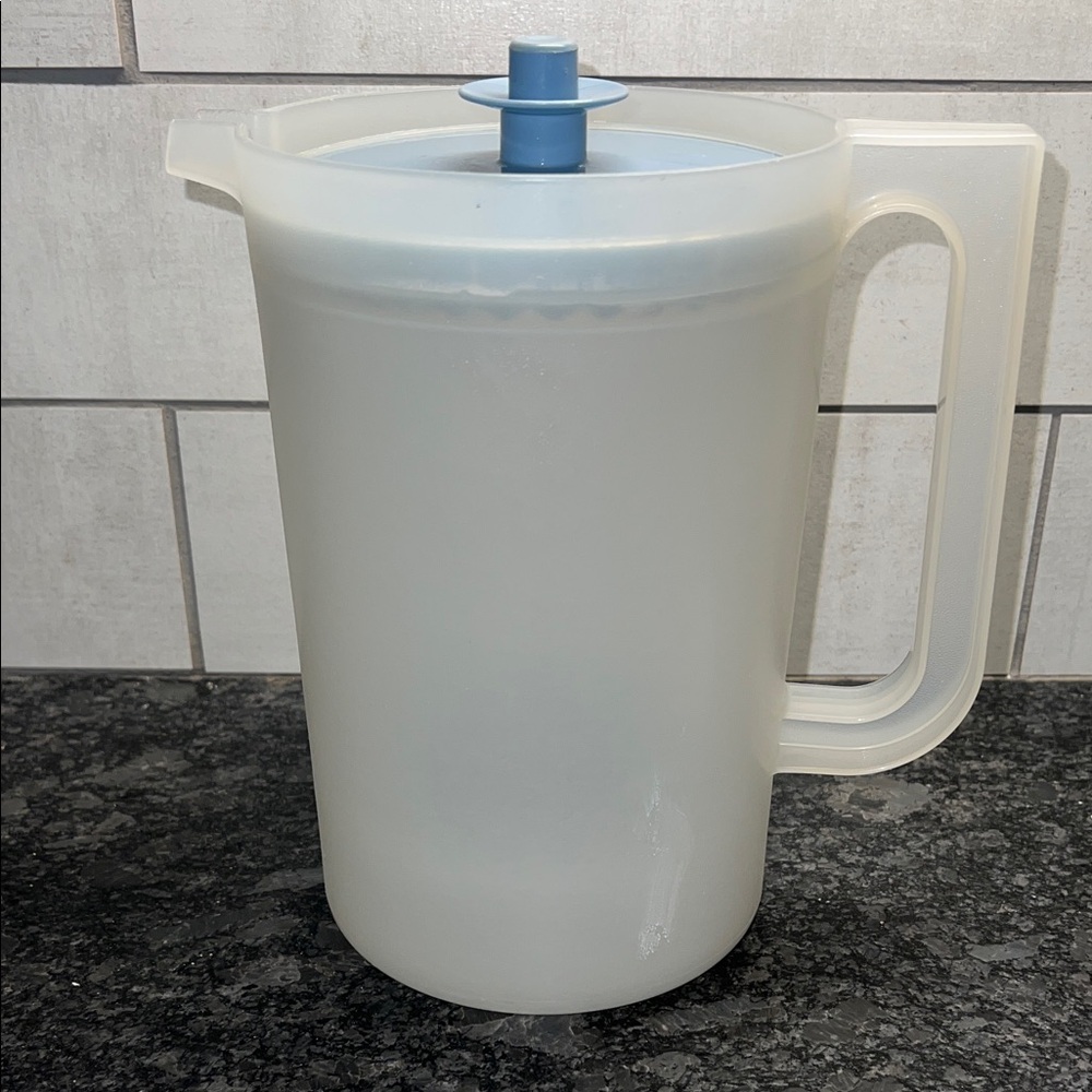 2qt Tupperware Translucent White Pitcher with Blue Lid. Like new